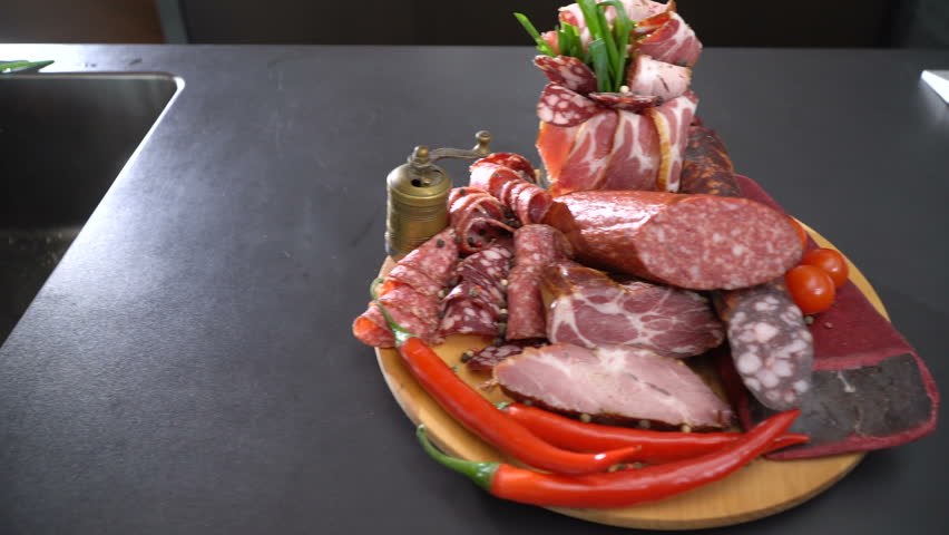Sliced smoked sausage and ham
