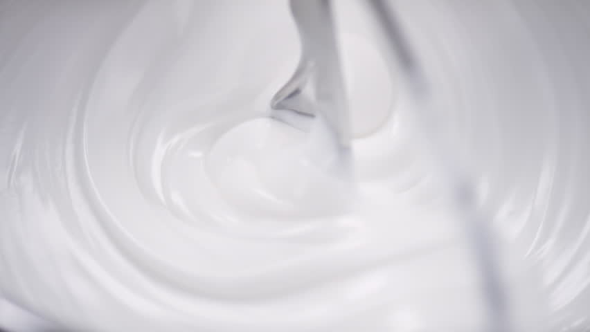 Mixer whirl white cream at high speed in the laboratory | Shutterstock HD Video #1021965394