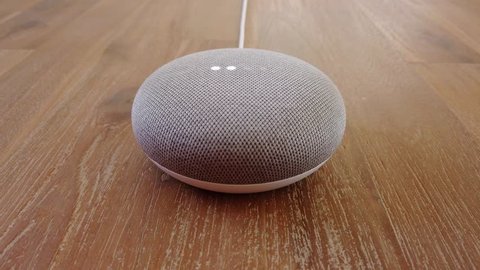 Google Home Mini - Mini Smart Home Voice Assistant Controlled Gadget Responding To Command