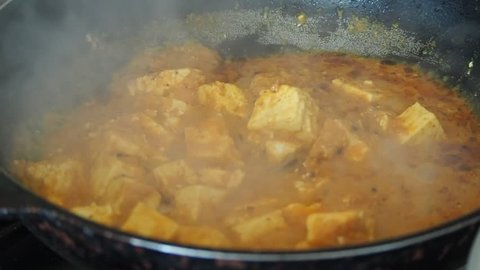 Cooking Shahi Paneer,  Indian cuisine cottage cheese curry
