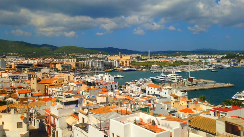 Cinemagraph - Clouds floating over the port of the Town of Ibiza on Ibiza Island.