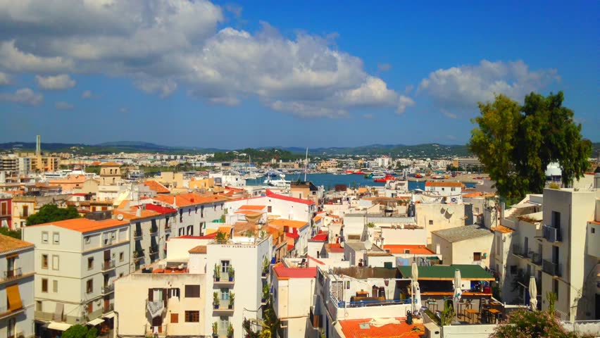 Cinemagraph - Clouds floating over the port of the Town of Ibiza on Ibiza Island.