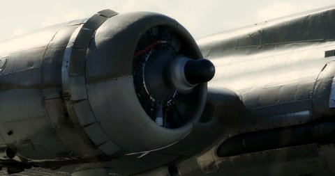 WWII propeller airplane engine spinning