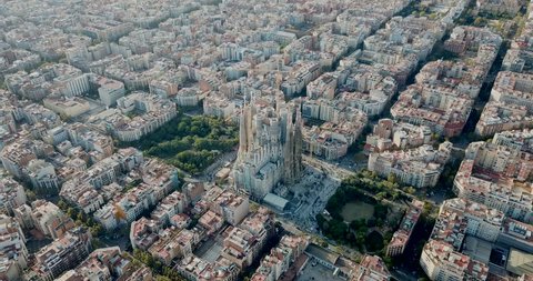 BARCELONA, SPAIN - OCTOBER 30, 2018: Modern urban landscape in Barcelona, panoramic view from drone of Eixample district and Sagrada Familia