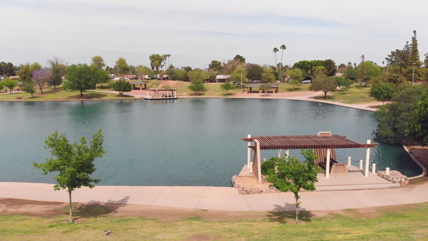Drone footage of a lake at a local park.