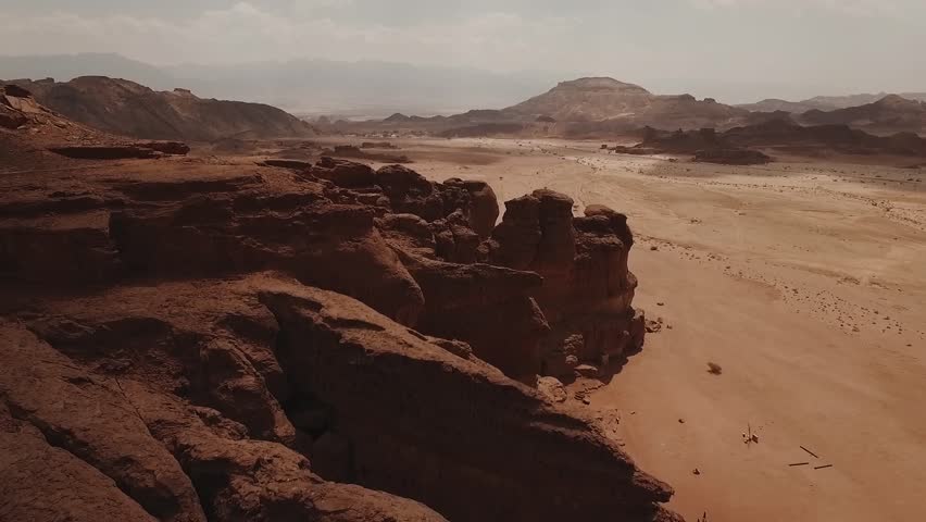 Timna Park in Israel next to Eilat. Shot with a drone. Desert looking landscape. Solomons Pillars