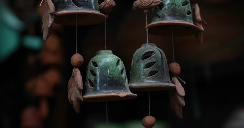Old Clay Wind Chime moving with breeze in Pune, Maharashtra, India. Video Stok