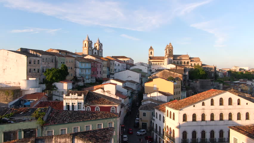 Salvador da Bahia, Brazil, aerial view of the historical district of Pelourinho showing colourful colonial buildings at sunset. Royalty-Free Stock Footage #1022046775