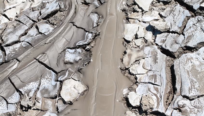 A local eruption of a mud volcano. Mud flows erupt in texture.