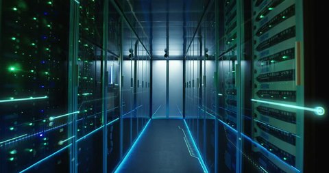 Dolly shot of the interior of a data center with glowing circuit board lines running along the wall