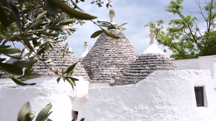 Italian trulli historical white buildings in Puglia region south Italy.  Royalty-Free Stock Footage #1022059294