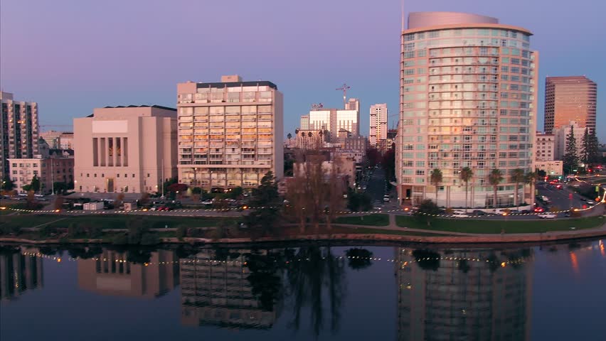 Aerial Shot Of Oakland City Skyline and Lake Merritt At Sunrise