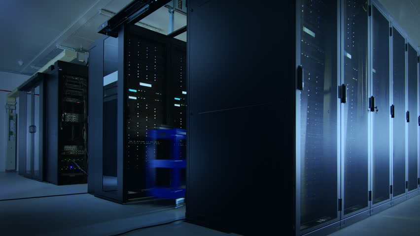 Time Lapse Footage of IT Employees Working in a Data Center Server Room. Technicians and Engineers Running Diagnostics and Maintenance, Inspecting Server Racks. Royalty-Free Stock Footage #1022086690