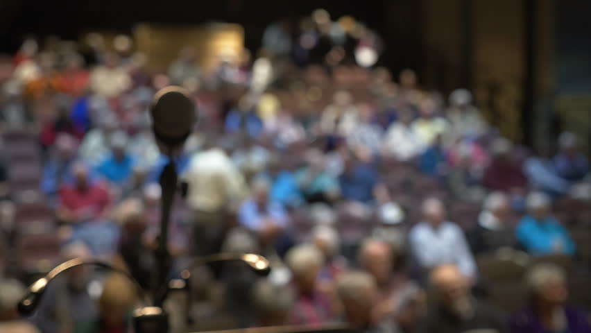 Stepping up to the microphone in front of crowd POV Royalty-Free Stock Footage #1022089465