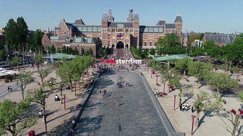 AMSTERDAM, NETHERLANDS - June 2018 Aerial view of Rijksmuseum, Dutch national museum and panoramic view of the Amsterdam City in 4K. Famous place to visit in Amsterdam