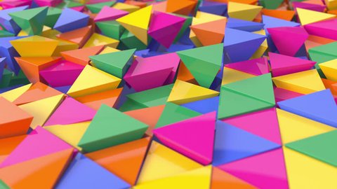 3D animation of abstract floating triangles in bright colors. 4k 3D animation.