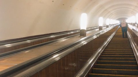 The steps of the escalator metro. Modern escalator electronic system moving. Escalator in the subway. Underground Escalator Conveyor in lifestyle Subway Train Station