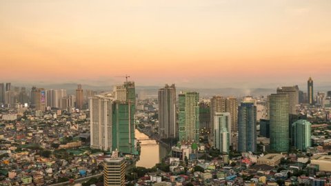 MANILA, PHILIPPINES - CIRCA MARCH 2018: Time-lapse view on the Skyline of Makati during sundown circa March, 2018 in Manila, Philippines.
