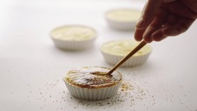 Food technique video, eating creme brulee with a spoon, part of a video series  about creme brulee or catalana, check the other video of the series