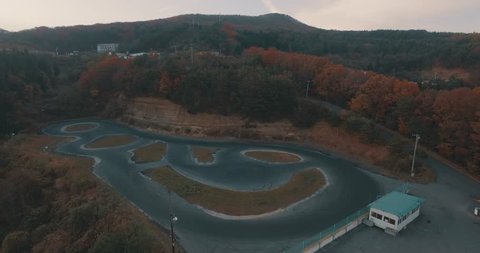 Fast Paced Aerial Drone Shot Of a Drifting Race Track in the Mountains of Japan.
