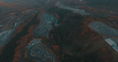 WIde Aerial Drone Establishing Shot of Multiple Race Tracks and Drifting Courses in the Japan Mountains.