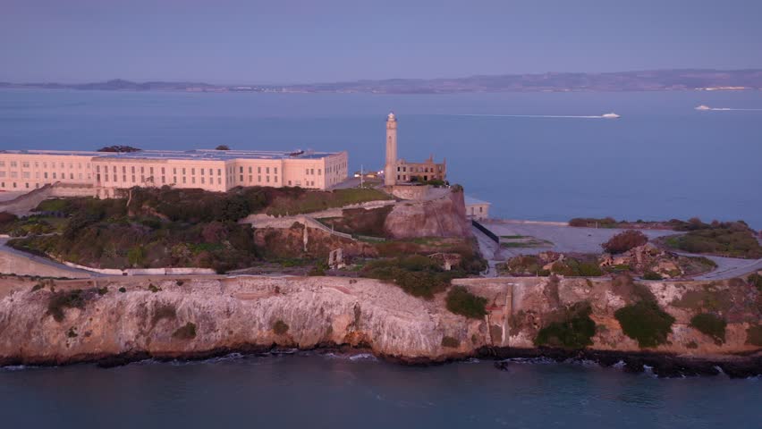 Aerial: Alcatraz Island at sunset in the San Francisco Harbour, USA 