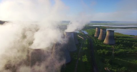 Aerial view of Power water cooling towers of electric power plant. Summer