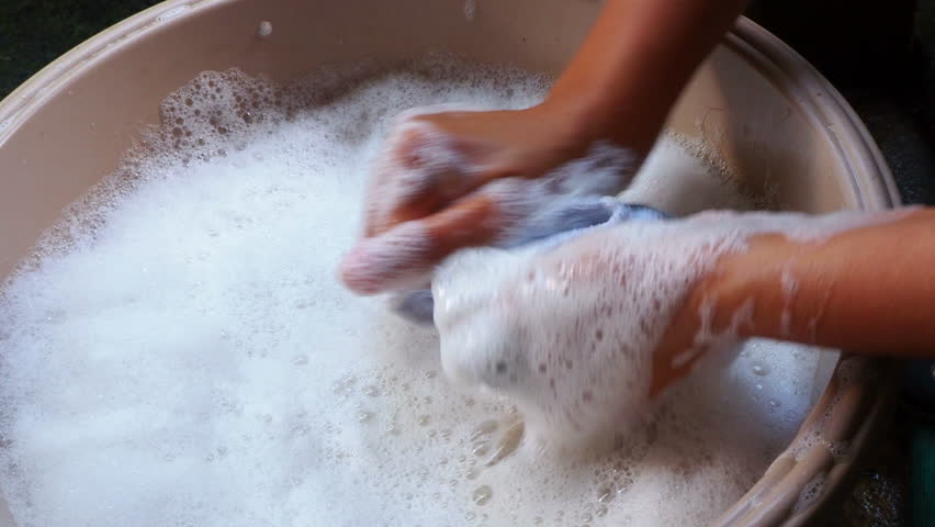 female hands washing clothes in basin. wash stain of dirty clothing by hand with detergent. motion 4k footage Royalty-Free Stock Footage #1022203054