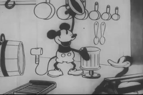 CIRCA 1939 - Early successes of sound film are highlighted: Disney's Steamboat Willie in 1928, All Quiet in the Western Front in 1931.