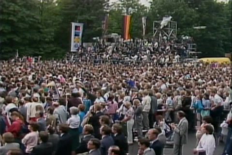 CIRCA 1980s - President Reagan is introduced in German before his speech at the Brandenburg Gate, Berlin 1987