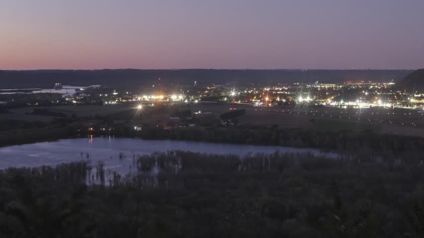 A High Angle Shot from Wyalusing State Park Overlooking the Wisconsin and Mississippi Rivers and Rural Prairie du Chien during a Fall Night 4K Time lapse