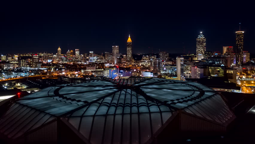 Atlanta Aerial v483 Hyperlapse crossing low to high over downtown at night, picturesque cityscape 12/18