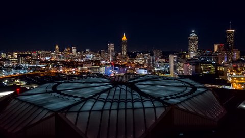 Atlanta Aerial v483 Hyperlapse crossing low to high over downtown at night, picturesque cityscape 12/18