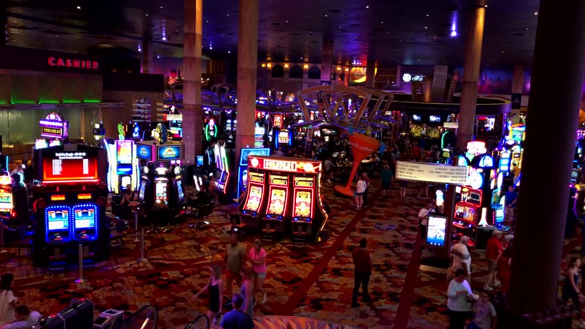 Las Vegas, USA - September 10, 2018: People are playing slot machines at MGM casino
