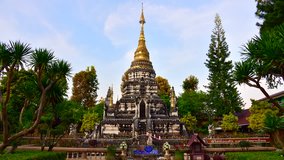 4K time lapse video of ancient pagoda with clouds flowing in Phra That Mae Chedi temple, Thailand.