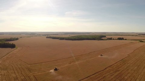 Combines Harvest Fields Aerial Top View