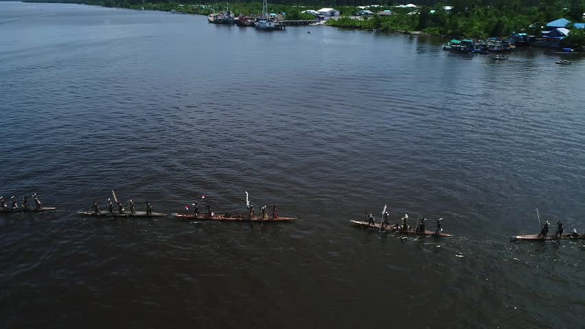 asmat canoe festival, papua, indonesia