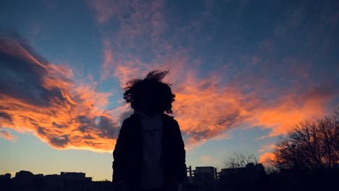 Amazing sunset in Baku with curly hair boy