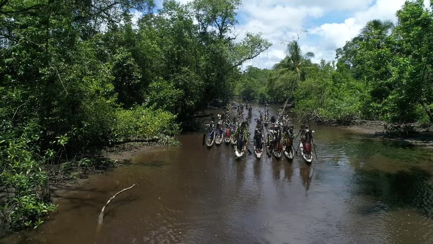 asmat canoe festival in yepem village, papua, indonesia