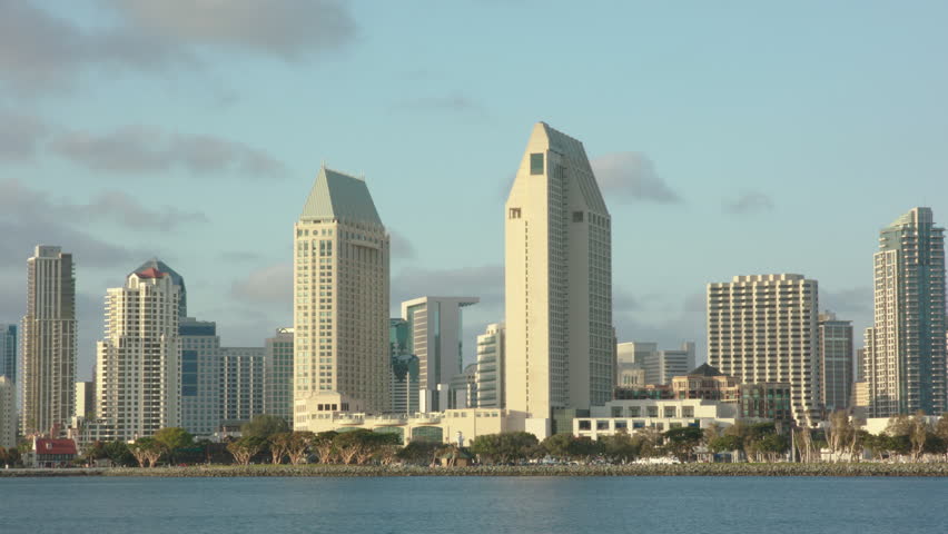 Time lapse of downtown San Diego California at sunset with golden clouds rolling by | Shutterstock HD Video #1022325640