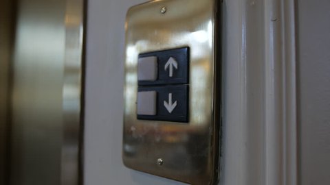 Slow move in to elevator button