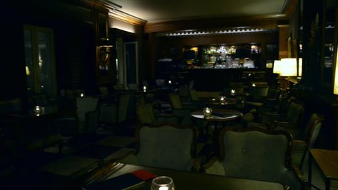 Estoril, Portugal - Jan 11, 2019: Man plays piano at famous Spies Bar at Hotel Palacio which was frequented by both German and Allied spies during WWII, as well as Ian Fleming, creator of James Bond