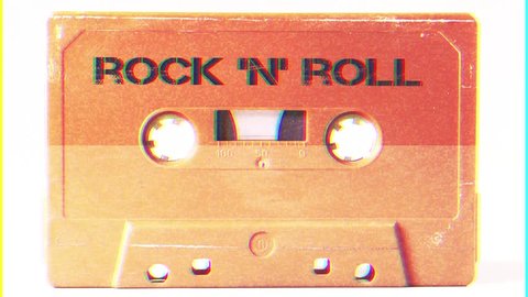 Intentional noise distortion fx tv transmission: a vintage cassette tape from the 1980s (obsolete technology) with the text Rock 'n' Roll. Color: cream, sand. White background.
