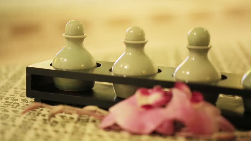 Shampoo or bath soap in ceramic bottle.