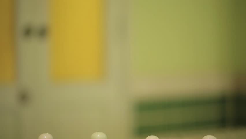 Shampoo or bath soap in ceramic bottle.