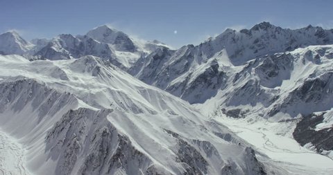 Himalayas wide shot POV AERIAL View near Mount Everest of snowcapped cold rock mountain in Nepal and Tibet