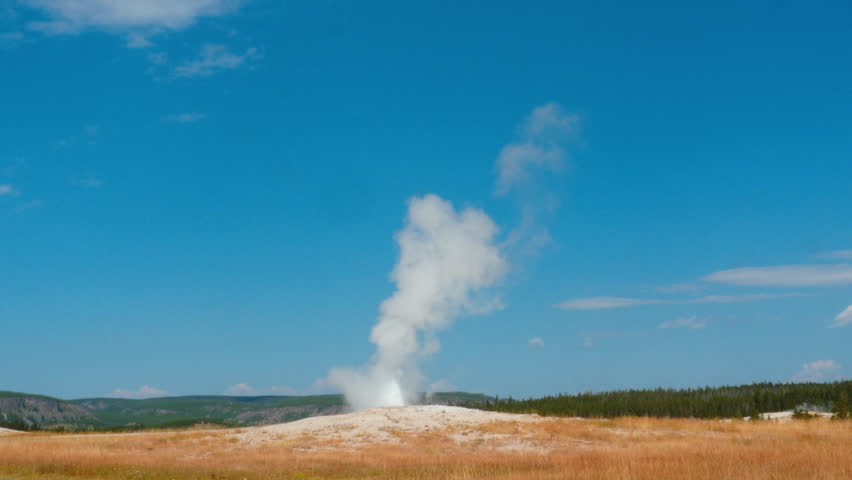 The Old Faithful Geyser at Upper Geyser Basin in Yellowstone National Park, WY, USA