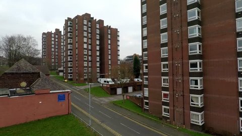 Aerial footage view of high rise tower blocks, flats built in the city of Stoke on Trent to accommodate the increasing population, council housing crisis