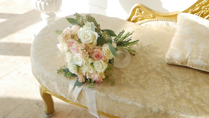 Delightful bouquet of delicate white and cream roses, slow mo, holiday