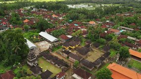 Flying with drone over balinese traditional temple. 4K aerial view footage, no edit.
